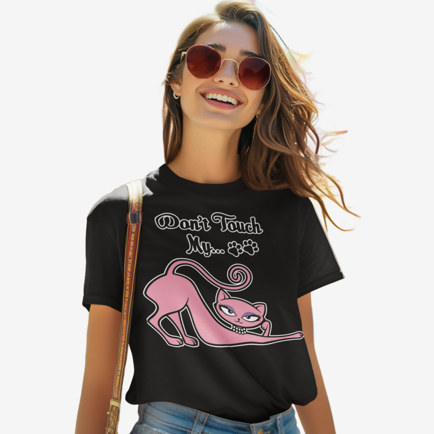 Woman wearing a black Don’t Touch My Kitty tee with pink cat artwork.