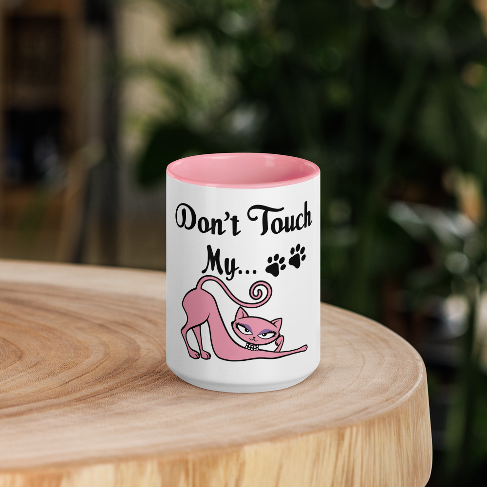 White ceramic mug with pink interior featuring the Don't Touch My Kitty pink cat design.