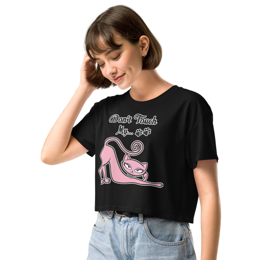 Smiling woman wearing a black Don’t Touch My Kitty crop top with pink cat artwork.
